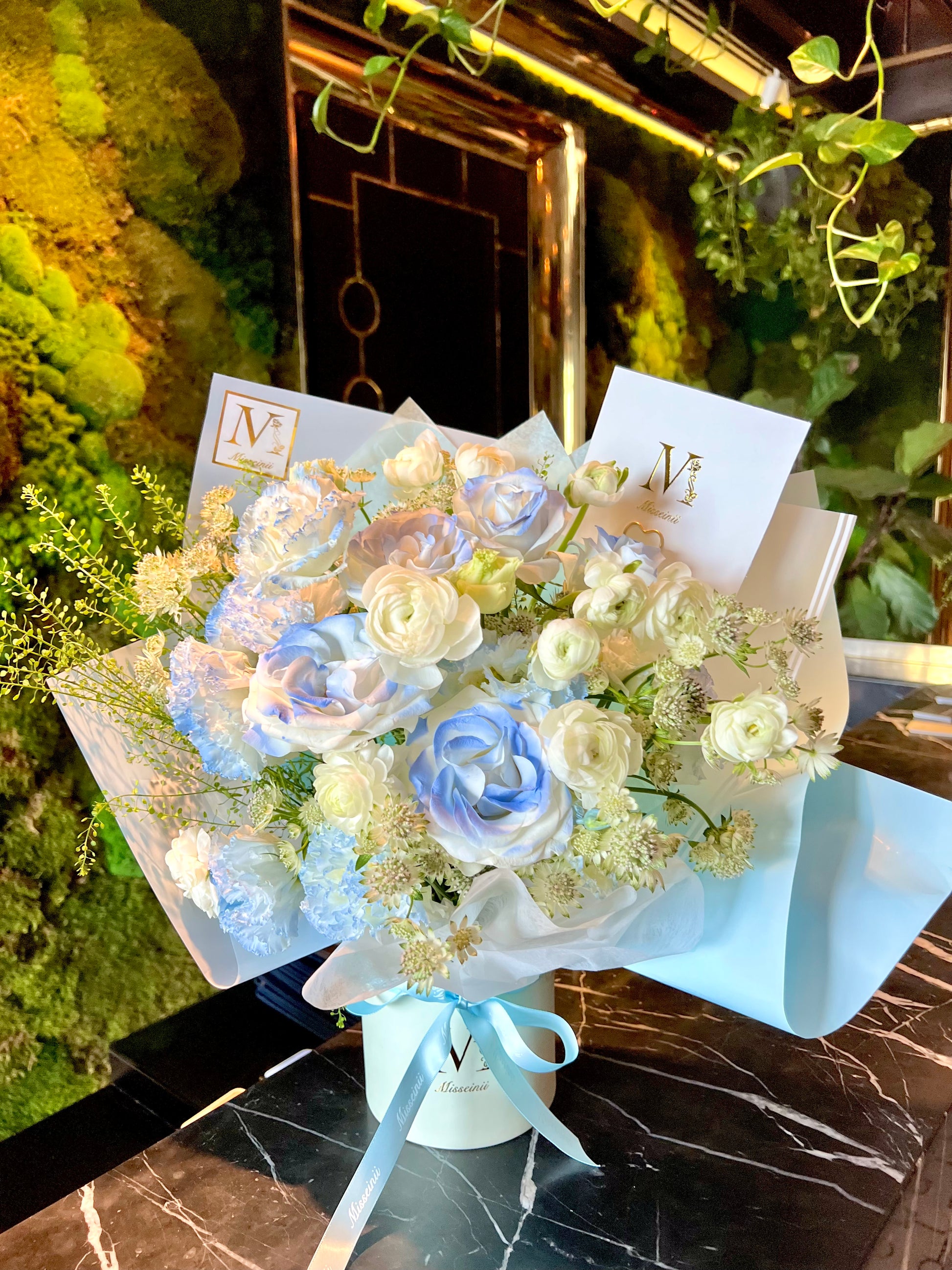 blue white roses ranunculus 3